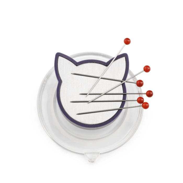 Cat pin magnet on a white background
