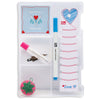 Set of sewing tools including a needle, thread, and a small container with heart designs on a white background.