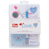 Embroidery starter set with heart designs in a clear packaging on a white background