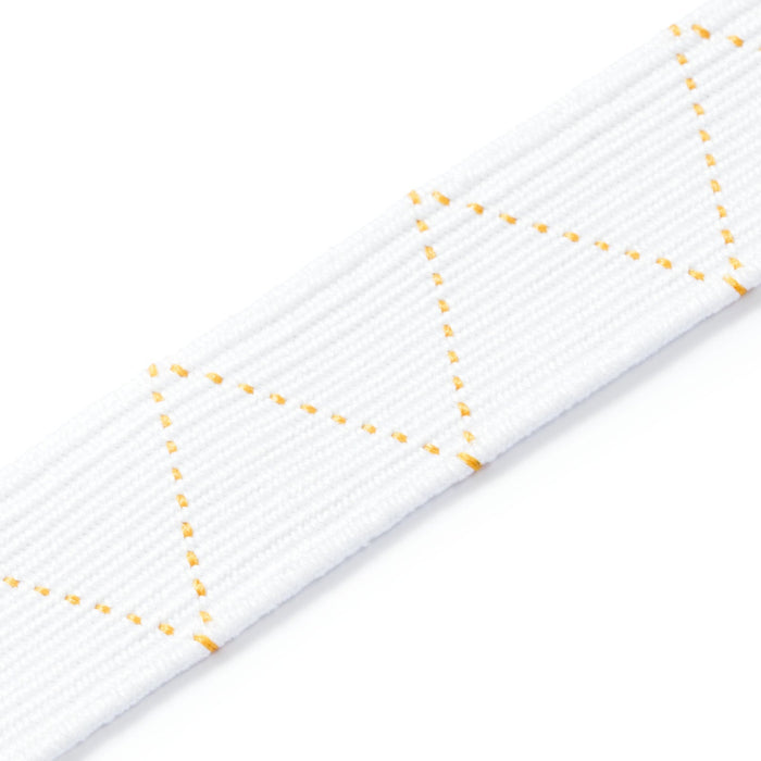 Close-up of a white elastic on a white background