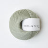 Ball of yarn with a label on a white background