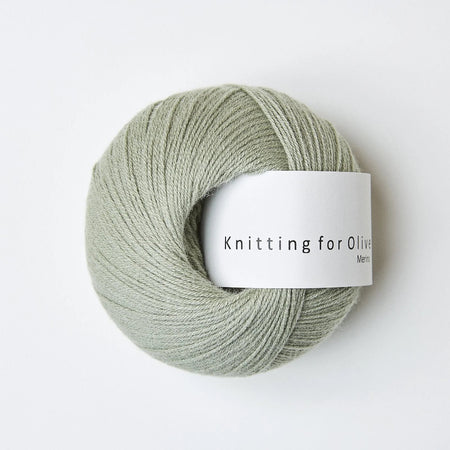 Ball of yarn with a label on a white background