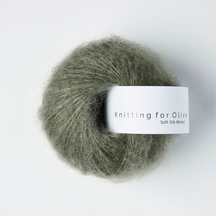 Ball of yarn with 'Knitting for Olive' label on a white background