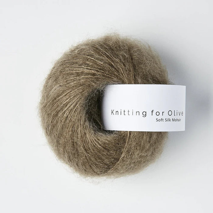 Ball of yarn with a 'Knitting for Olive' label on a white background
