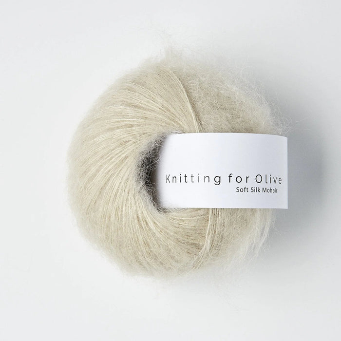 Ball of yarn with 'Knitting for Olive' label on a white background