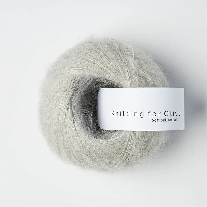 Ball of yarn with 'Knitting for Olive' label on a white background
