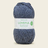 Ball of yarn with a Sirdar Loveful label on a light background