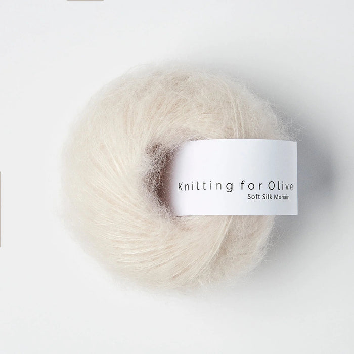 Ball of yarn with 'Knitting for Olive' label on a white background