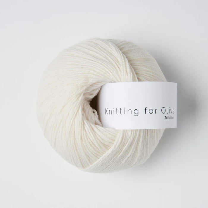 Ball of yarn with 'Knitting for Olive' label on a white background