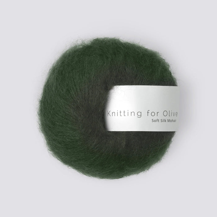 Green skein of yarn with 'Knitting for Olive' label on a white background