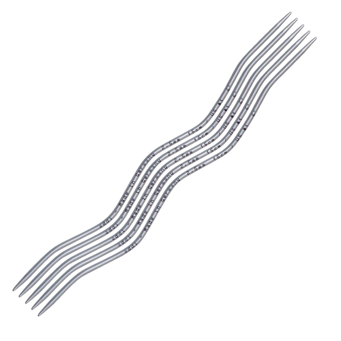 Set of metal hairpins on a white background