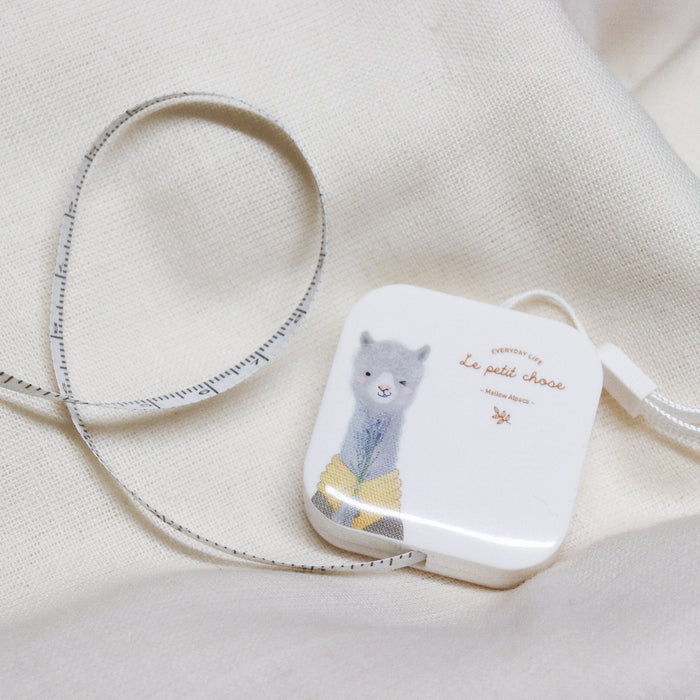 retractable tape measure with lama motif