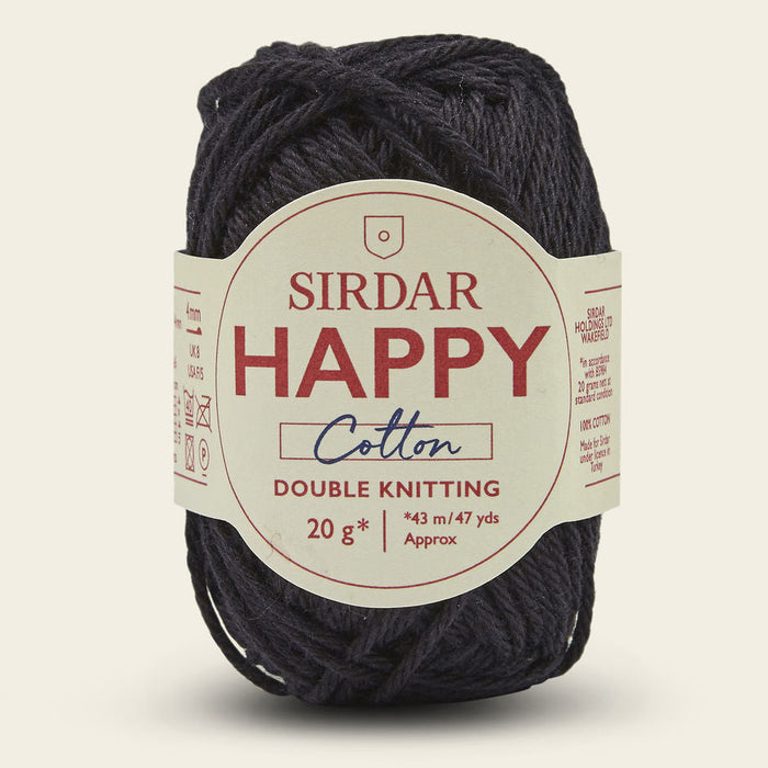Ball of Sirdar Happy Cotton yarn with label on a beige background