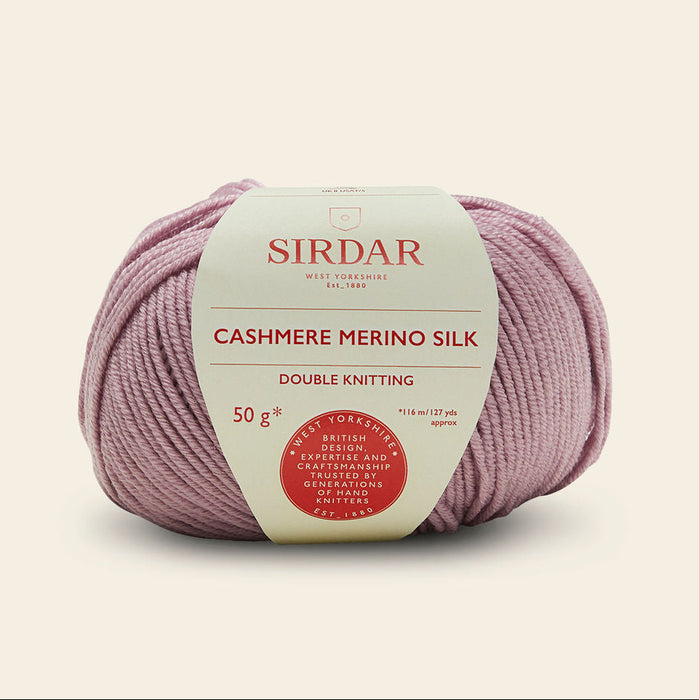 Ball of Sirdar Cashmere Merino Silk yarn on a beige background