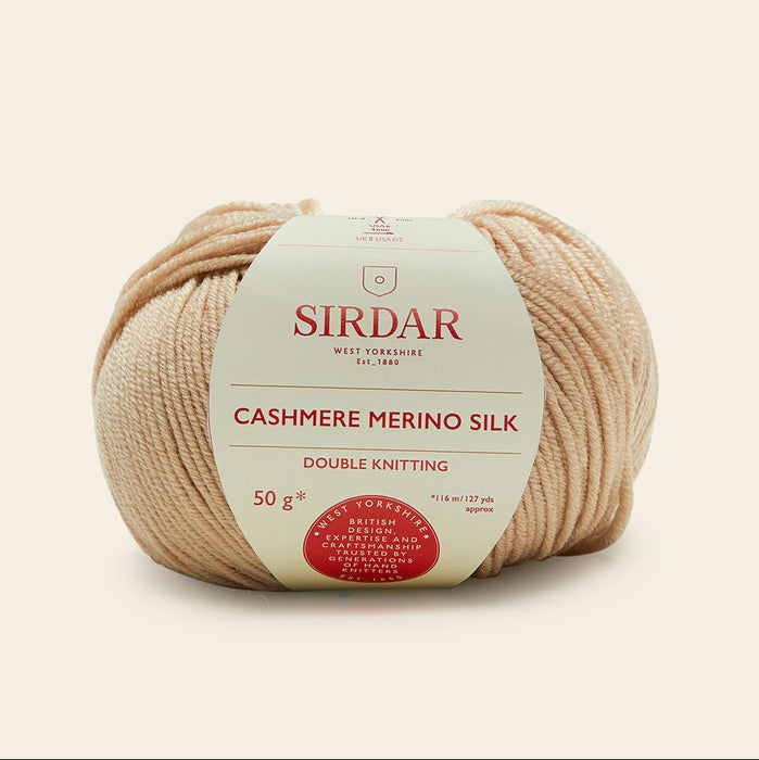 Ball of Sirdar Cashmere Merino Silk yarn on a beige background