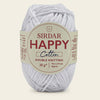 Sirdar Happy Cotton yarn ball with label on a beige background