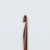 Multicolored crochet hook on a white background