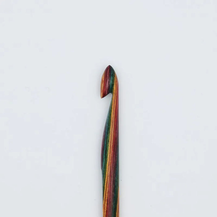 Multicolored crochet hook on a white background