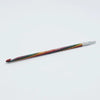 Crochet hook with multicolored handle on a white background