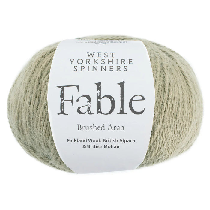 Ball of yarn with West Yorkshire Spinners Fable label on a white background